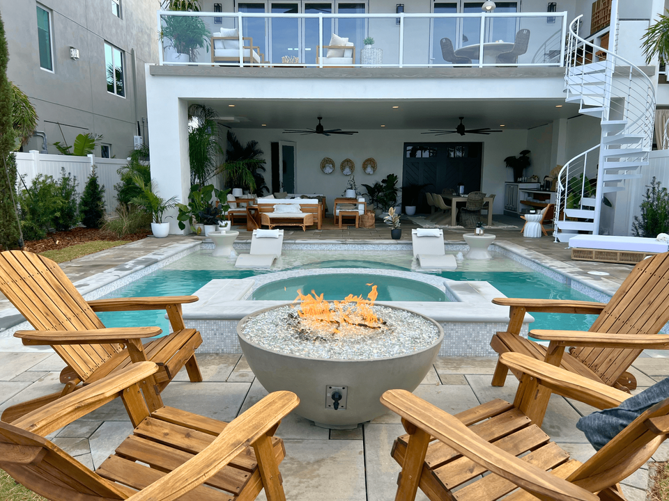 Evan Thomas & Keith Bynum's Custom Patio Space Featuring A Fire Table, Pool, Spillover Spa, Sunshelf, & An Outdoor Kitchen From Season 5 of Rock The Block