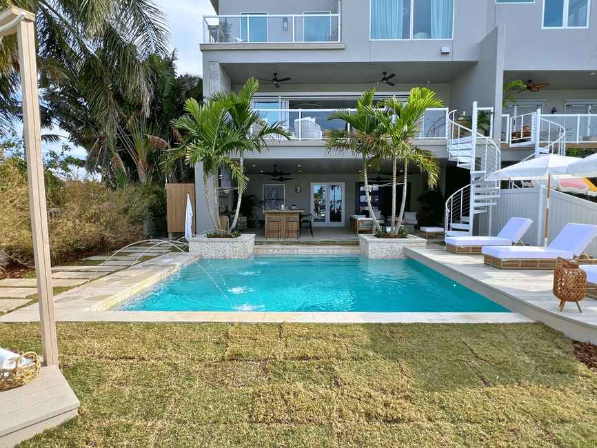 Sarah and Bryan Baeumler's Pool & Patio Space Featuring Laminar Jets, Custom Planter Beds, & A Cantilevered Sundeck From Season 5 of Rock The Block