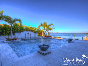 Waterfront Linear Pool Project Featuring A 360 Spillover Spa, Scupper Water Feature, And Fire Bowls In Hillsborough County