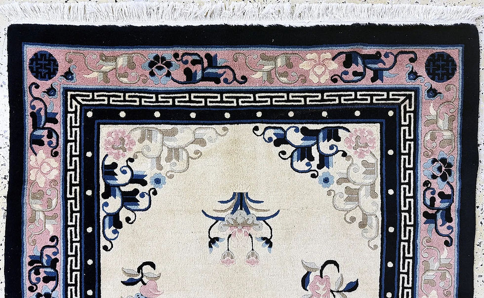 Light ivory vintage Chinese rug with blue and pink floral motifs, central geometric medallion, pink and blue border