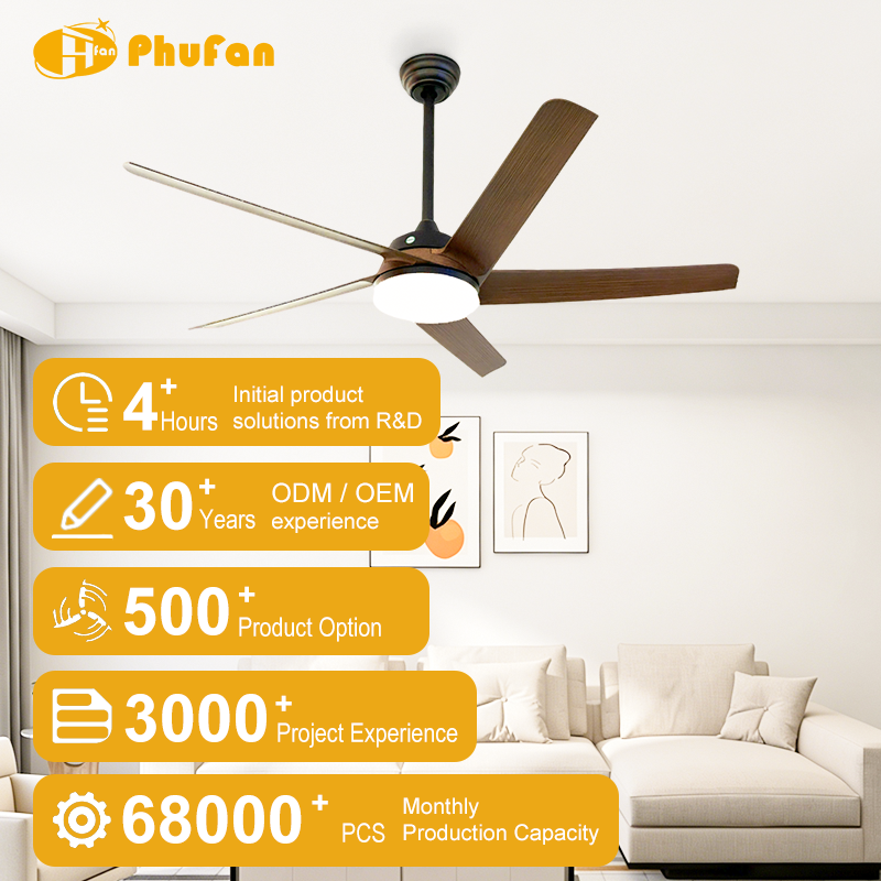 Wood grain ceiling fan with light for living room, five blades and a long black downrod pictured above a cream sofa.