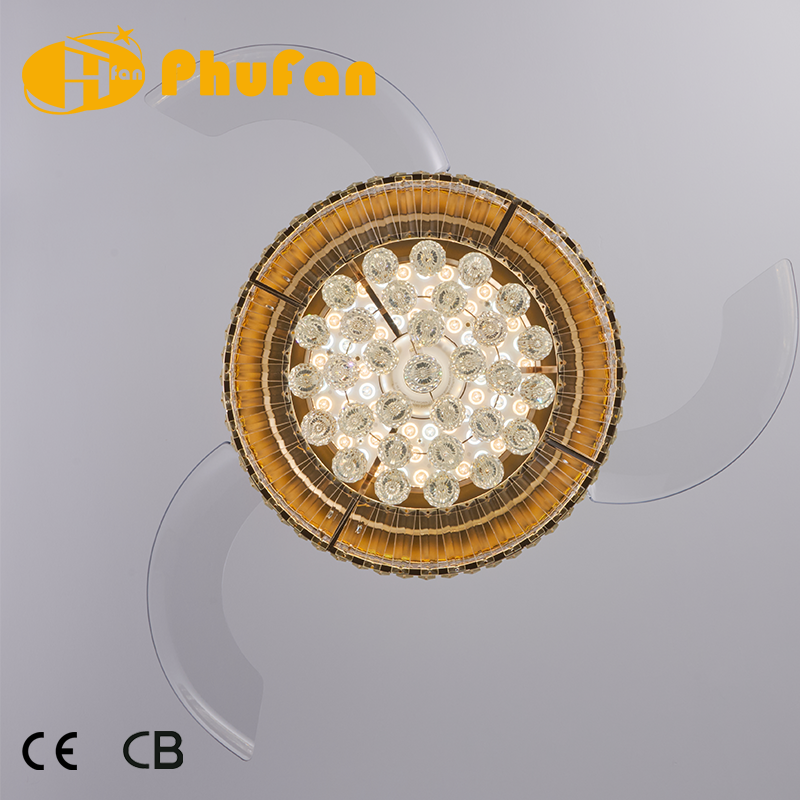 Bottom view of a gold crystal fan light, showing the round faceted crystals and extended transparent blades.