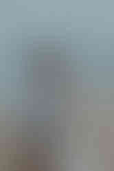 Lumière douce et ciel nuageux créant une ambiance poétique pour la séance photo à Saint Lunaire, Bretagne