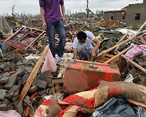 98 Mense dood na tornado oostelike Sjina tref