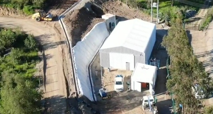 Concrete canvas installation for slope protection