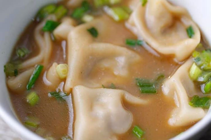 Wonton soup with scallions