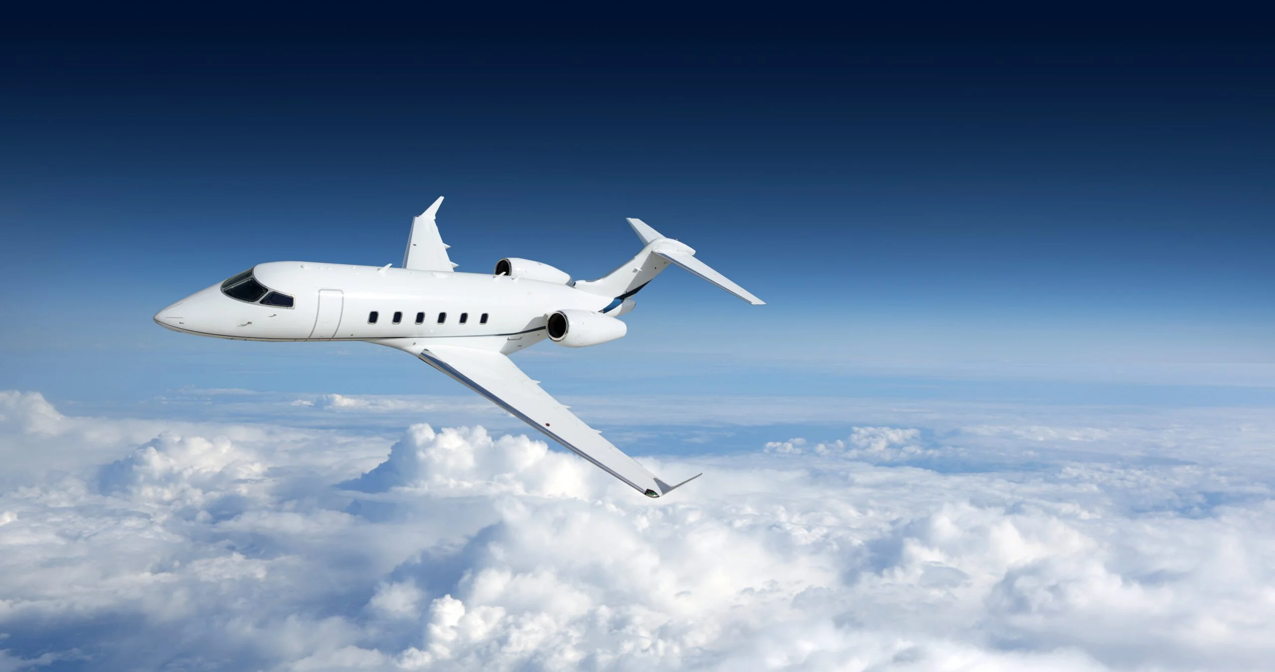private-jet-in-clouds-scaled-e1606414154885.webp