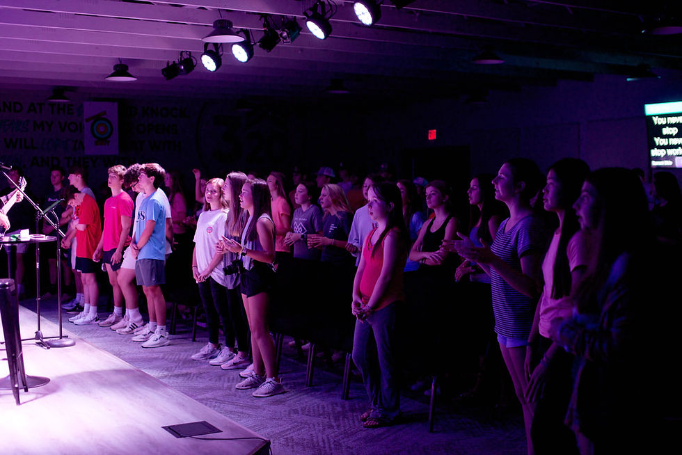 Students gather together and worship God