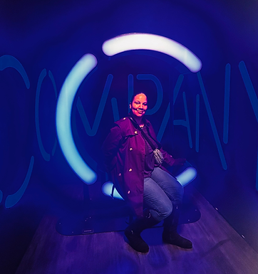 Allison Coleman at the Broadway Museum in New York City during a cultural travel experience celebrating Broadway theater and
