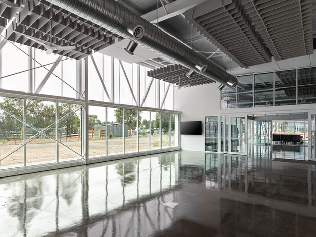 CREST Education STEM Building STEM hub featuring BACH Commercial acoustic baffles and polished concrete flooring.