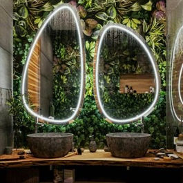 Futuristic backlit LED mirror with triple tone option and large illuminated surface.