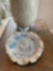 and built pottery plate with ruffled edge