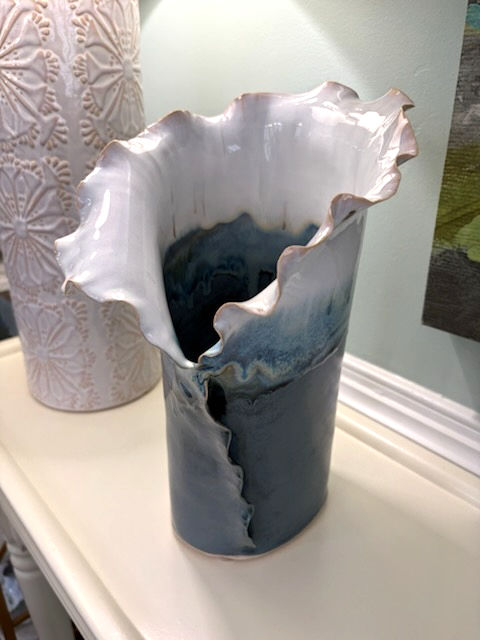 Thumbnail: Sculptural ocean blue ceramic vase in handbuilt stoneware with a fluted white ruffled edge.