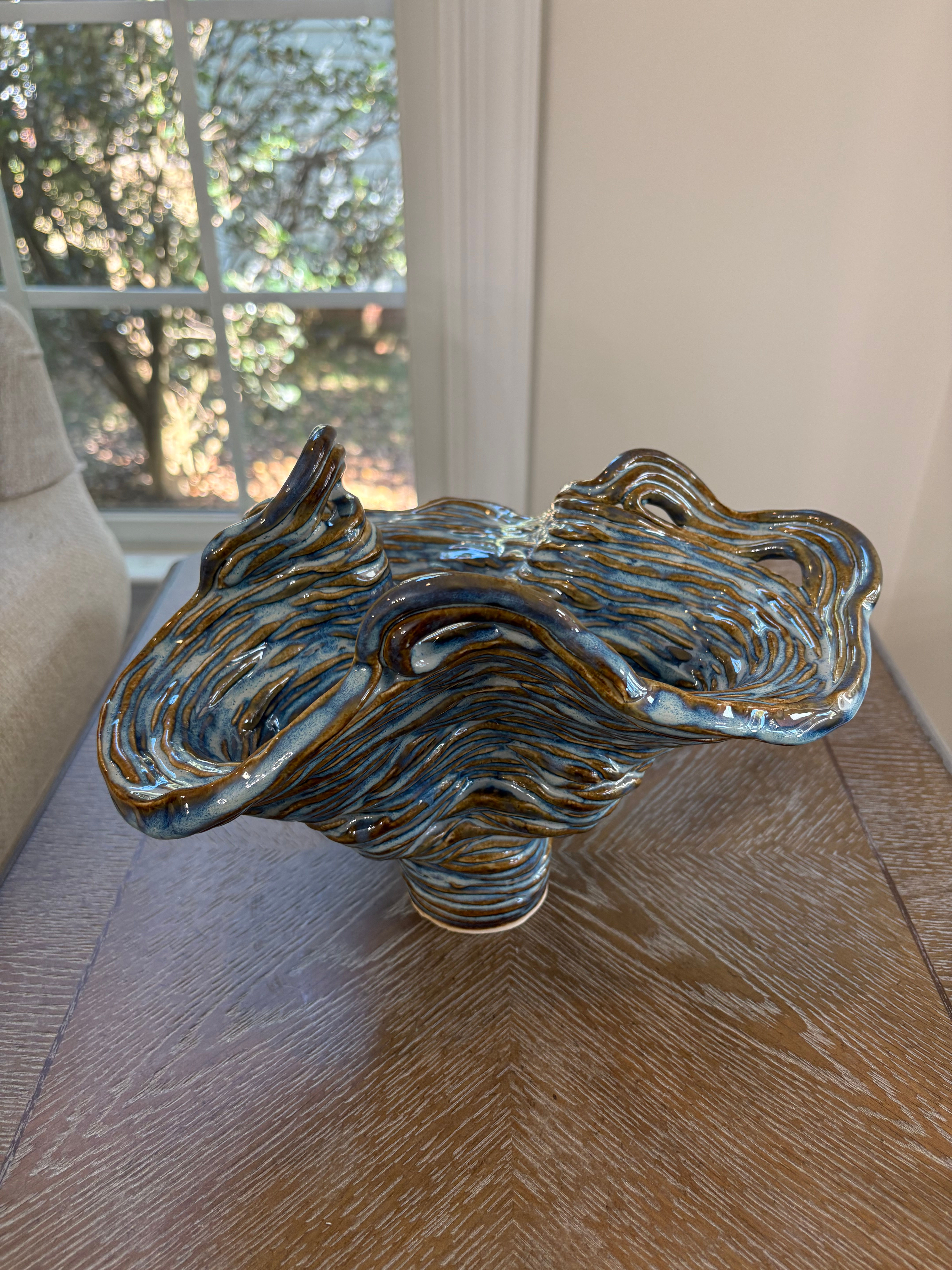 Handbuilt coil-built ceramic sculptural vessel, blue and amber ruffled edge artwork