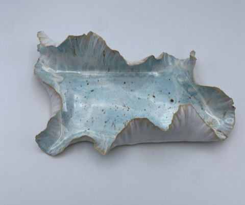 Thumbnail: Luxury sculptural coastal platter in light blue speckled glaze handmade in Charlotte, soft ruffled edge