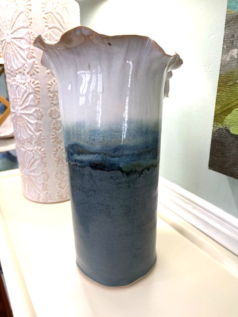 Thumbnail: Sculptural ocean blue ceramic vase in handbuilt stoneware with a fluted white ruffled edge.