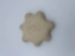 Back of Ceramic Garlic Grater that looks like a star