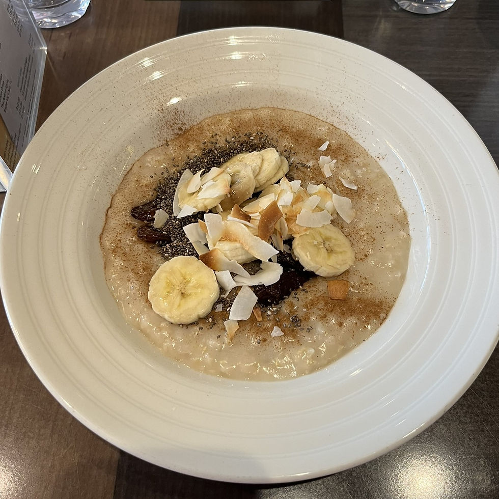 Lido oatmeal with cinnamon, raisons, banana & flaked coconut