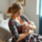 new mother holding her baby .jpg