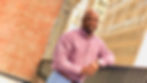 Leadership Development Executive smiling in urban setting
