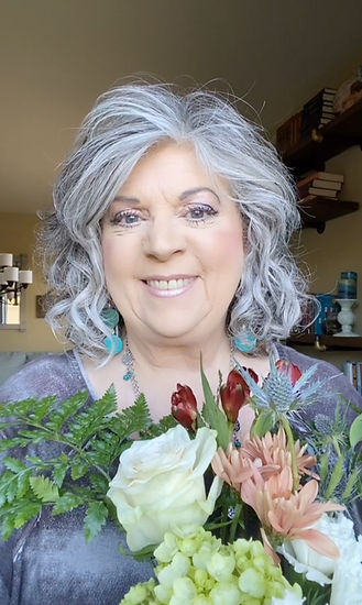 Vicki Kawelmacher holding flowers