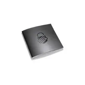 Security hardware. A dark grey Trezor Model T cryptocurrency wallet with logo.