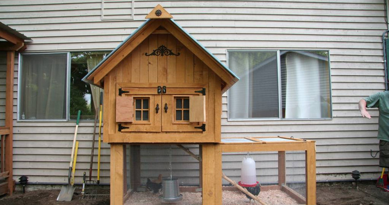 Beautiful custom backyard builds by Decks and Spas featuring deck and hot tub, privacy screen, BBQ centers, and firepits. Composite decking. Located in Redmond, Serving the Eastside, and Greater Seattle.