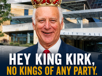 Kirk Watson with crown as king