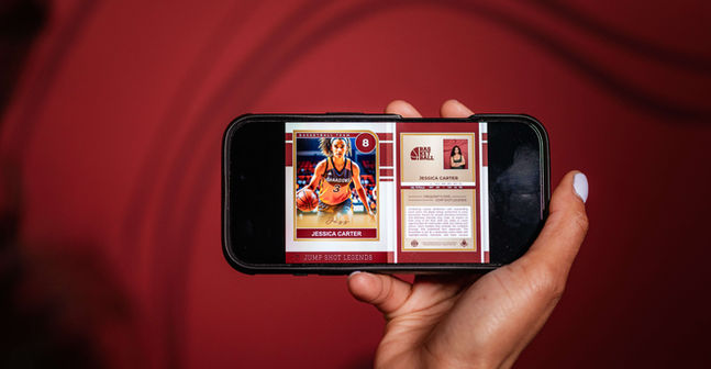 Employee sharing digital trading card on social media