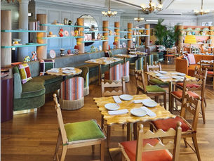 a restaurant with tables and chairs