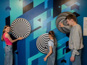 kids in front of a blue wall