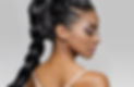 Facial Treatment | A brunette woman with smokey-eye make-up look and braided hairstyle.