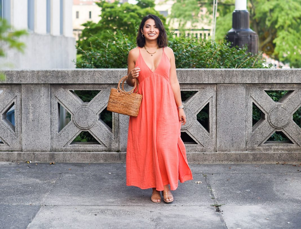 eoman wearing a coral dress