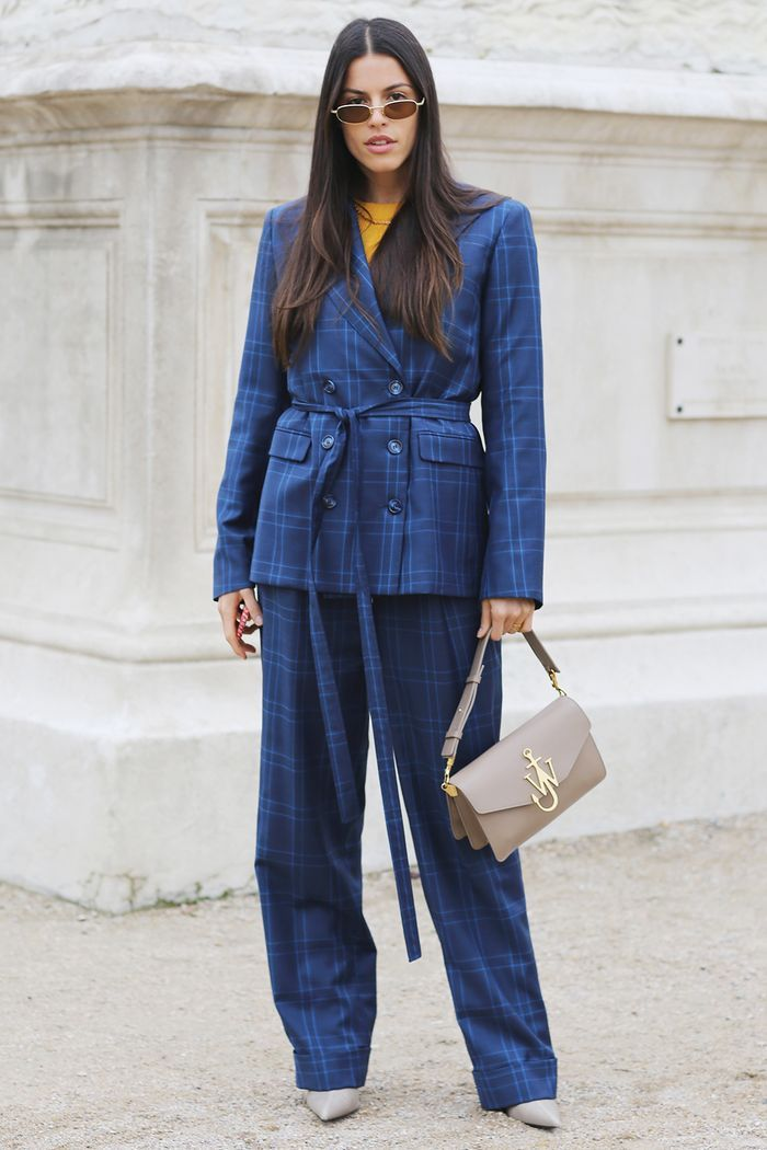 Woman wearing dark blue outfit