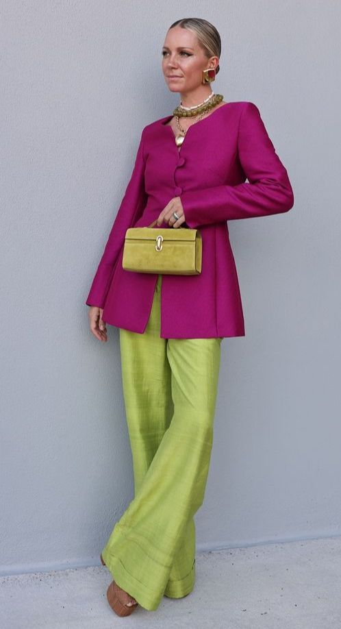 Woman wearing chartreuse and magenta color outfit