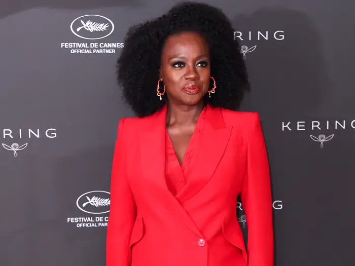 Viola Davis wearing a red suit