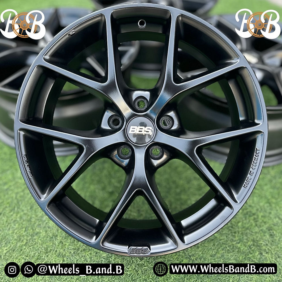 Close-up of a black car wheel with BB text and wheels B and B