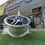 Thumbnail: Car wheel in front of Ain Al Saqr, AMG STYLE IV (W211) shop, wheels B and B