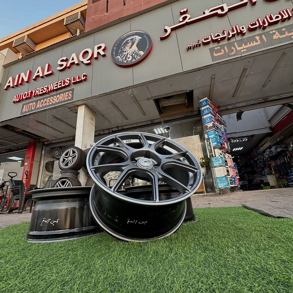 Thumbnail: AIN AL SAQR shop front displaying wheels B and B. Auto accessories available.