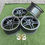 Thumbnail: Four dark wheels with the text B and B on green grass wheels B and B