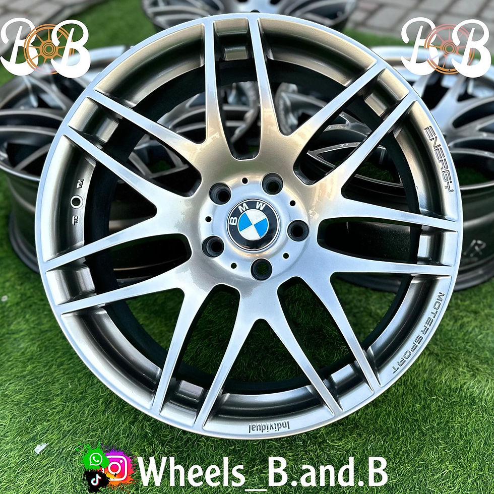 Silver car wheel with BB text and Wheels_B.and.B brand. wheels B and B