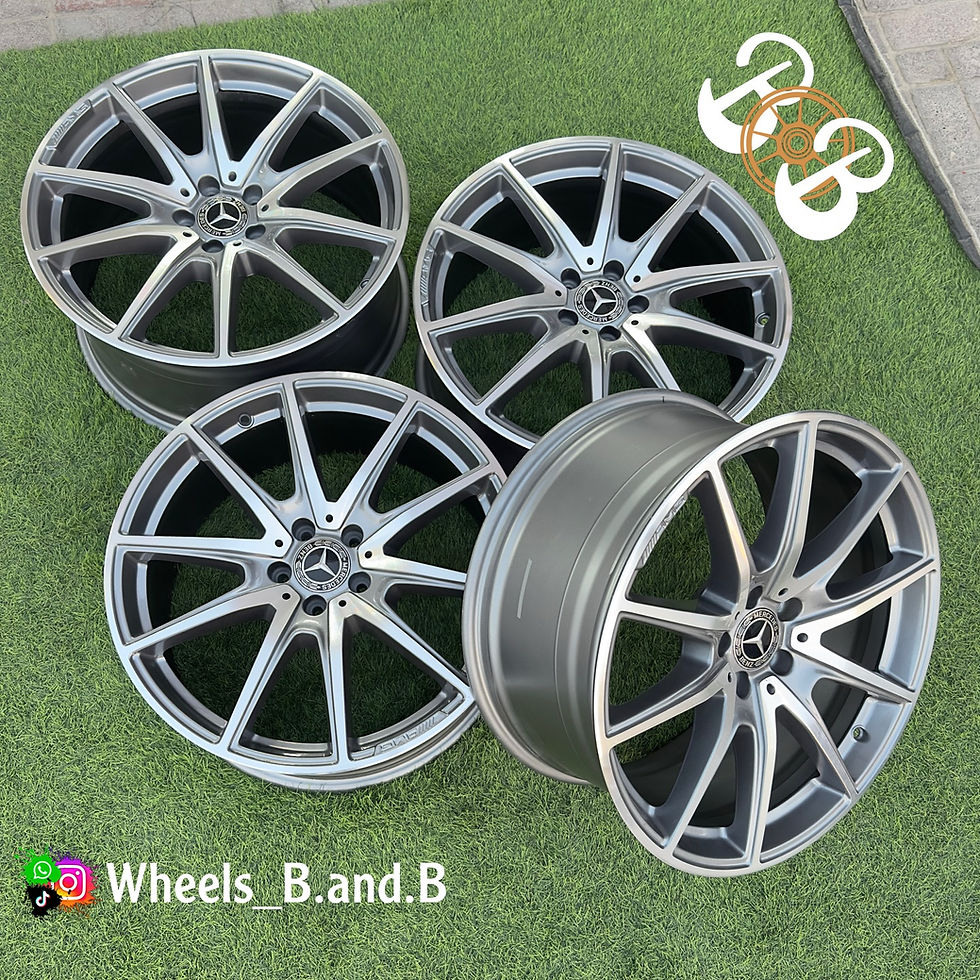 Four silver wheels B and B, Wheels_B.and.B BBS RG (717) arranged on green grass