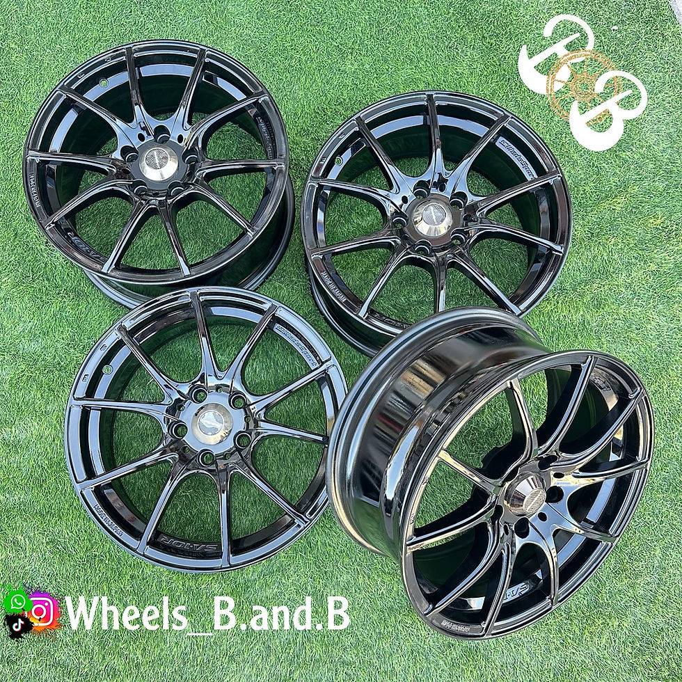 Four black wheels with text Wheels B. and B. wheels B and B