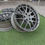 Thumbnail: Gray RAYS GL 57FXZ wheels on green grass B and B wheels.