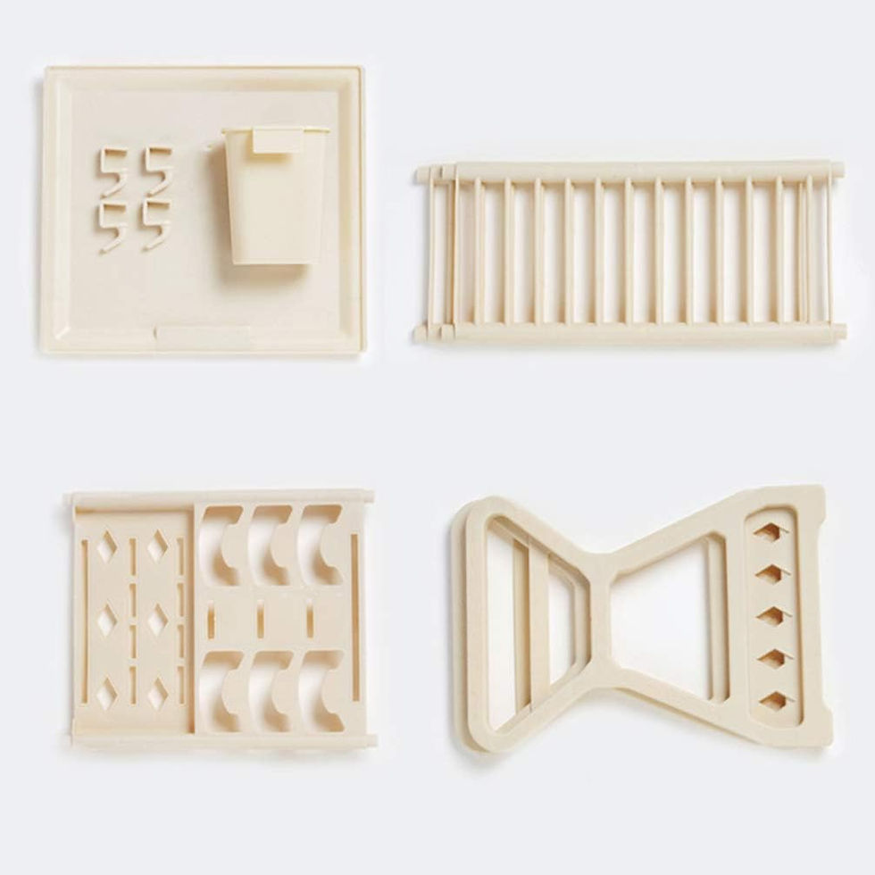 Thumbnail: Four beige plastic cookie cutters