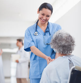 doctor-greeting-recovering-senior-patient-wheelchair (1).jpg