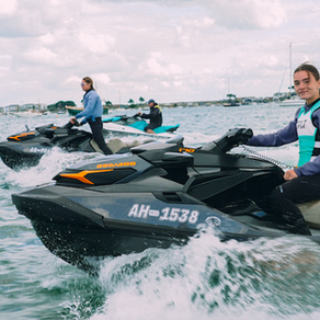 Female Jetskiers in Poole Harbour with New Wave Club
