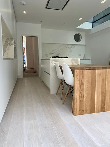 modern-kitchen-dining-area-oak-breakfast-bar-skylight-11.jpg