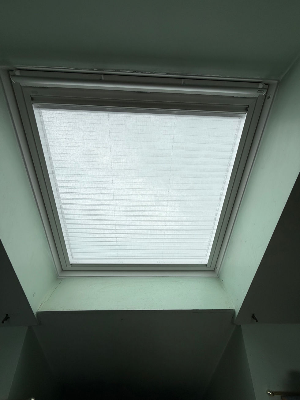     VELUX roof windows installed in a pitched roof with interior finish.