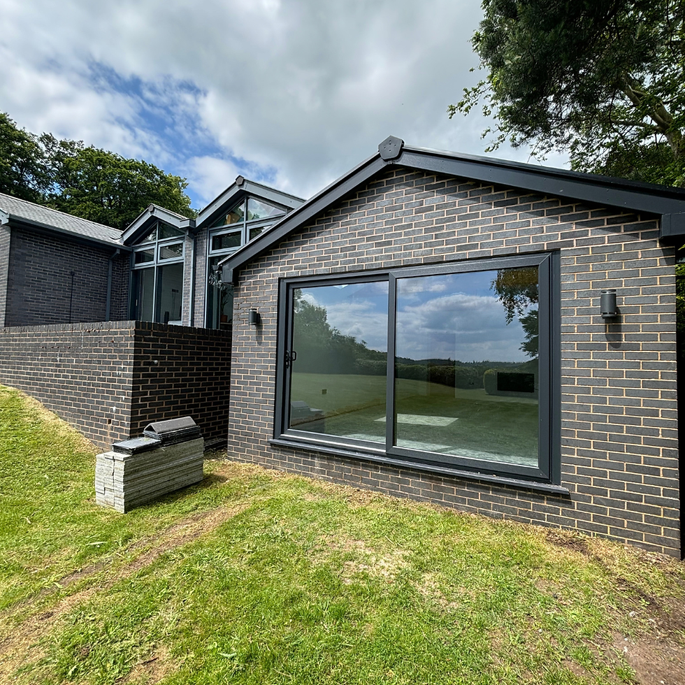 Contemporary single-storey extension with a full-height picture window, Kidderminster